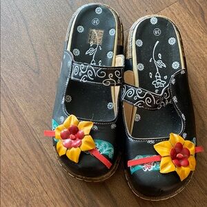 Flowered slip on shoes